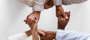 How does David Fradin deal with cross-functional politics in a product management role